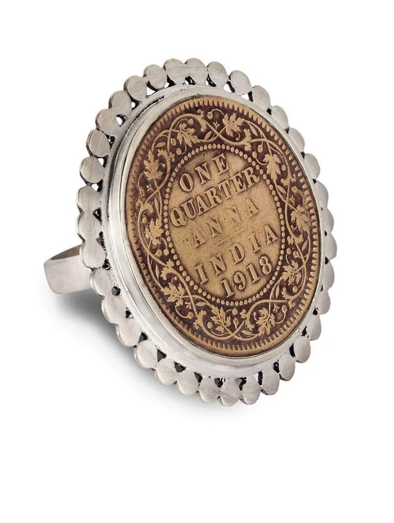Dramatic, vintage Indian-coin ring with a silver border