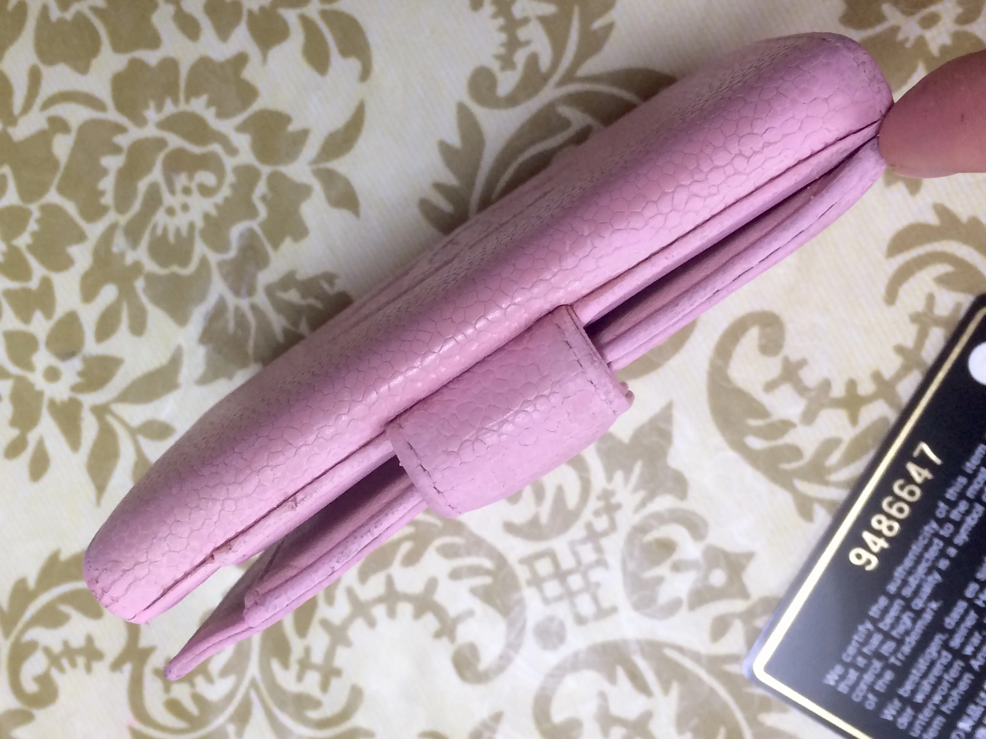 Vintage CHANEL milky pink caviar leather wallet with stitched CC mark. Classic.