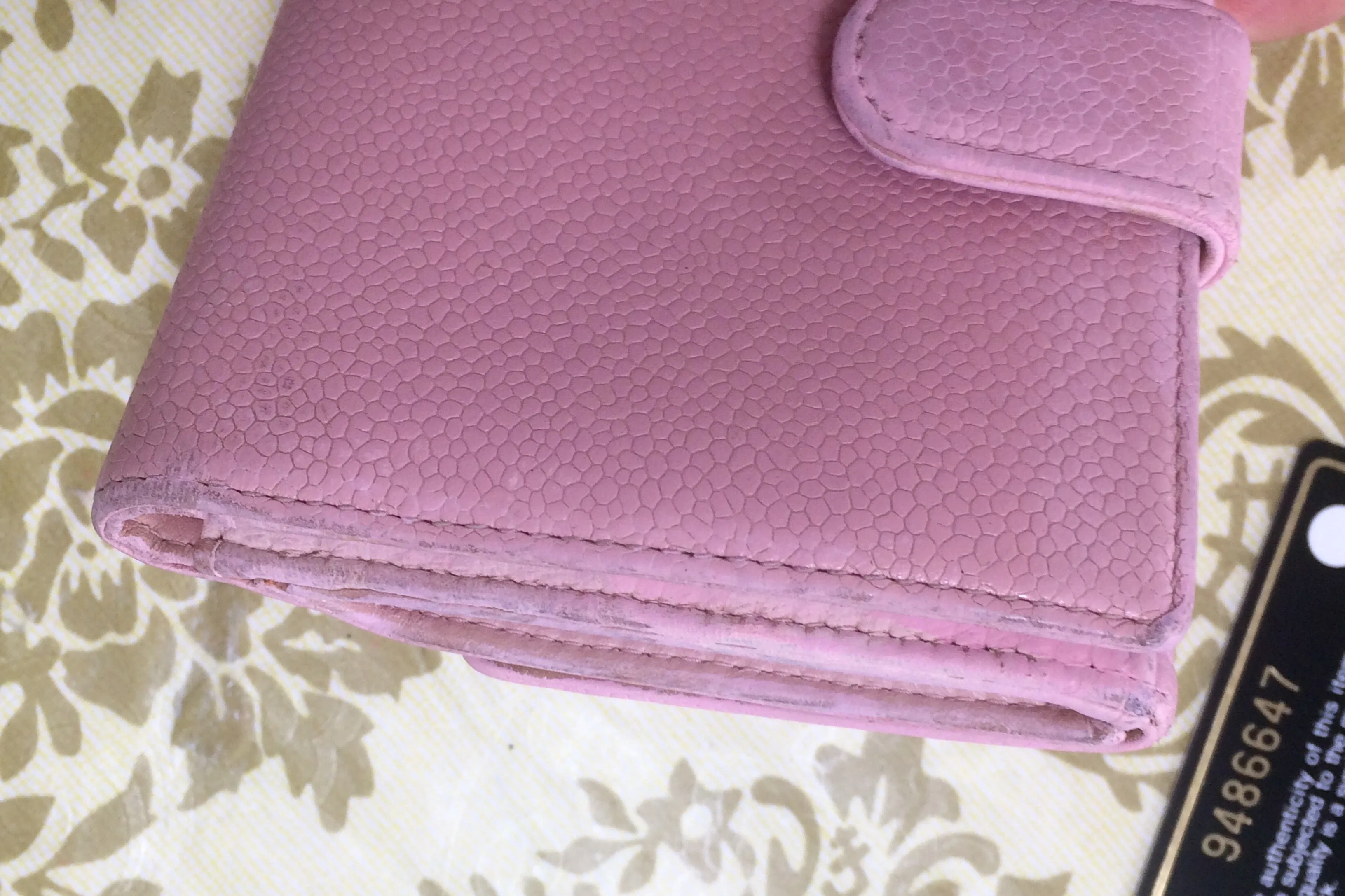 Vintage CHANEL milky pink caviar leather wallet with stitched CC mark. Classic.
