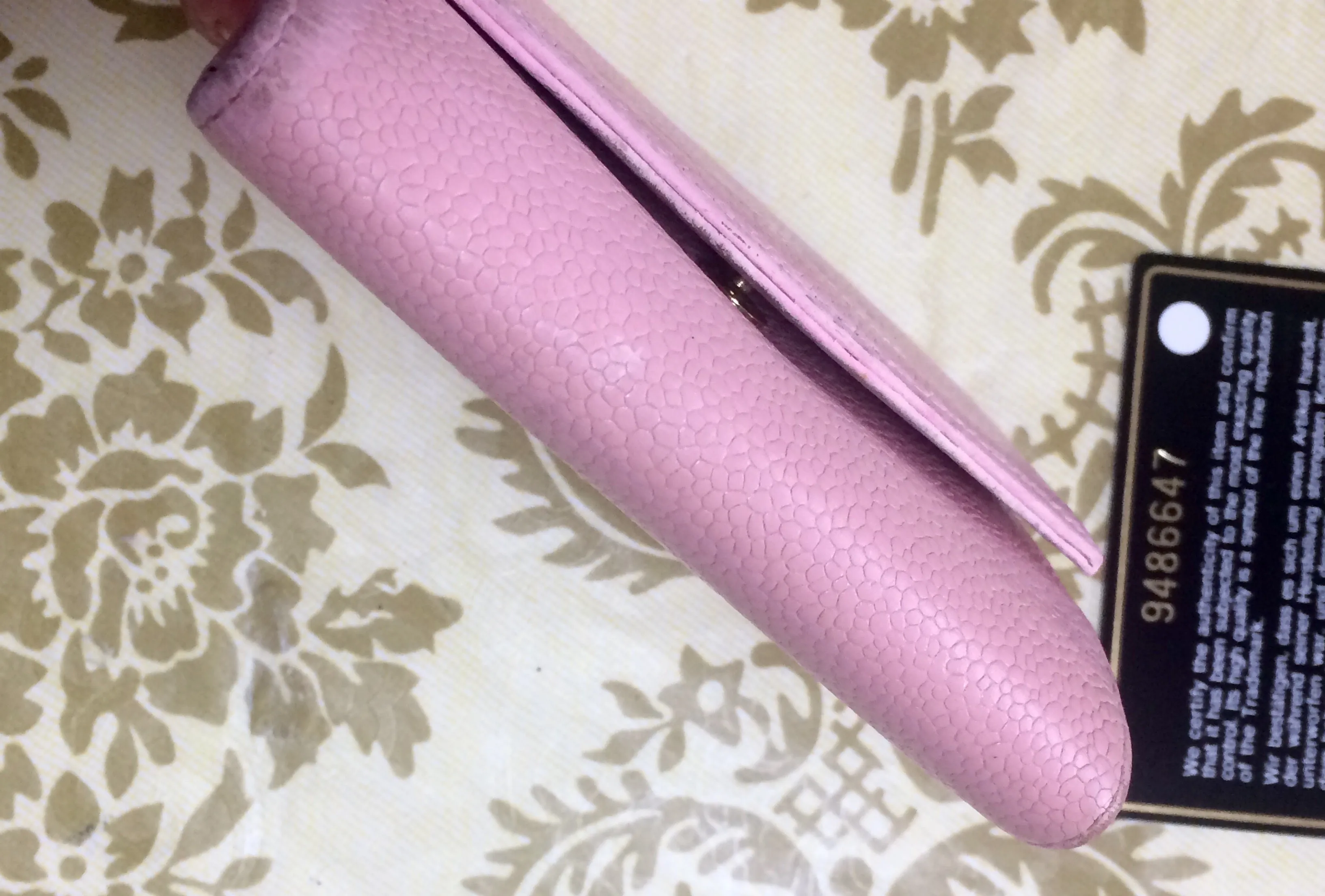Vintage CHANEL milky pink caviar leather wallet with stitched CC mark. Classic.
