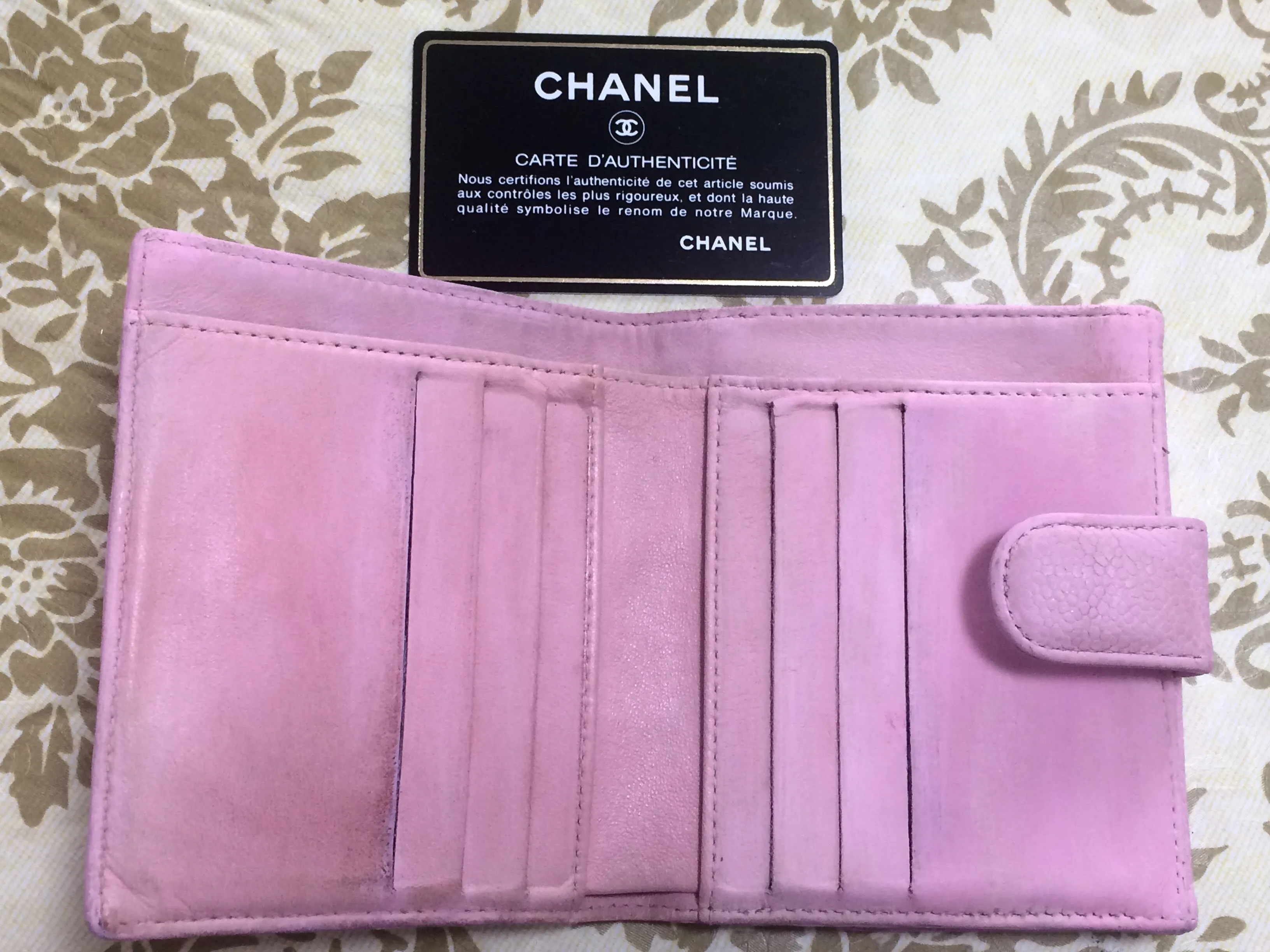 Vintage CHANEL milky pink caviar leather wallet with stitched CC mark. Classic.