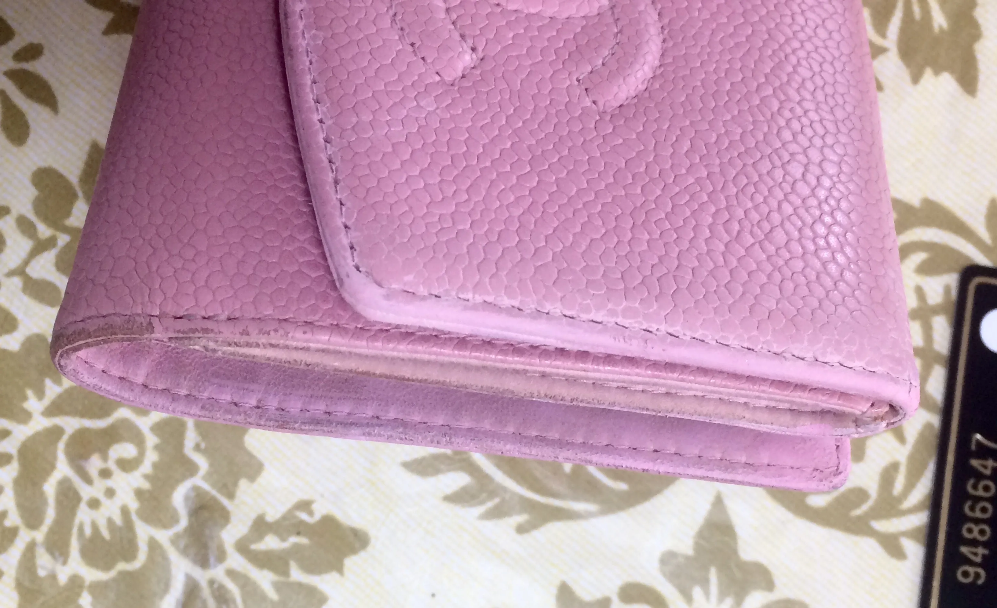Vintage CHANEL milky pink caviar leather wallet with stitched CC mark. Classic.
